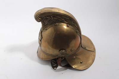 Lot 740 - Edwardian Brass Merryweather Fireman's helmet with brass chin chains, leather lining and label for Merryweather & Sons, Firemen's outfitters London.