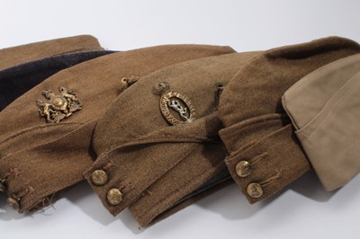Lot 748 - Second World War British military side cap with Royal Corps of Signal cap badge, dated 1940 to interior, together with another also dated 1940 and four further side caps (6)