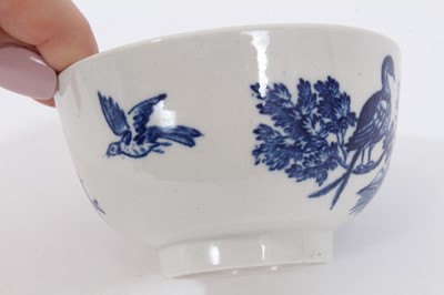 Lot 90 - Worcester tea bowl and saucer, circa 1775, printed with the Birds in Branches pattern, the saucer measuring 13cm diameter 
Provenance: Williams-Wood Collection