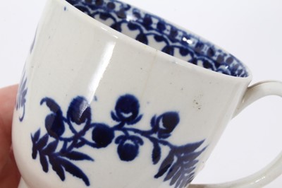 Lot 96 - Liverpool blue and white coffee cup, circa 1775, decorated with flowers on the outside and a foliate pattern on the inside rim, 6.5cm high
