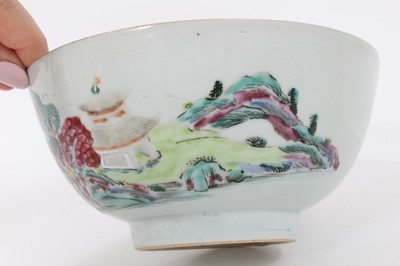 Lot 99 - Chinese famille rose bowl and saucer, Qianlong period, the bowl decorated with landscape scenes, and the saucer with a bird and flowers, 15cm and 11.5cm diameter (2)