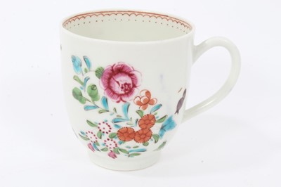 Lot 103 - Worcester coffee cup, circa 1770, polychrome painted with flowers, with iron red inner border, 6.5cm high