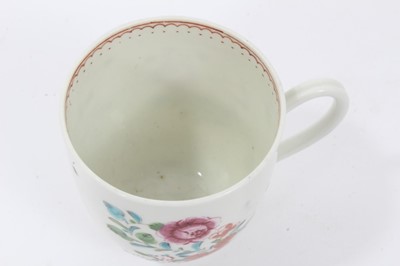 Lot 103 - Worcester coffee cup, circa 1770, polychrome painted with flowers, with iron red inner border, 6.5cm high