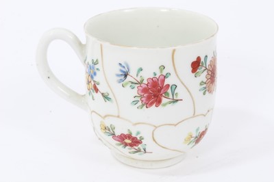 Lot 105 - Worcester coffee cup, circa 1770, painted with flowers with wavy gilt borders, 5.75cm high