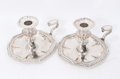 Lot 367 - Two pairs of Old Sheffield plate chamber sticks of octagonal shape with gadroon borders C.1805.