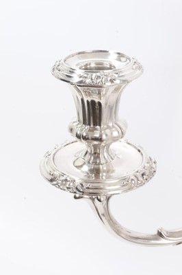 Lot 373 - Old Sheffield plate candelabrum on a scalloped base with scroll and floral borders
