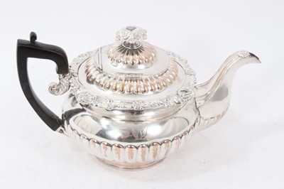 Lot 368 - Old Sheffield plate teapot of bulbous form with a half fluted body and cover