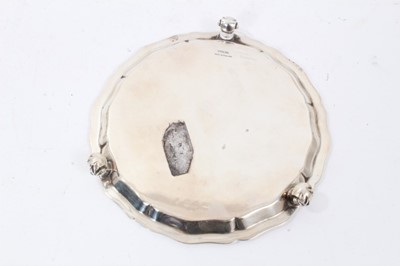 Lot 378 - Contemporary silver waiter of circular form, with pie crust border and engraved  inscription..