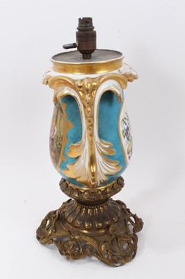 Lot 110 - Good Sèvres style porcelain lamp, standing on an ormolu base, the lamp decorated with figural scenes on a blue and gilt ground, total height 44cm