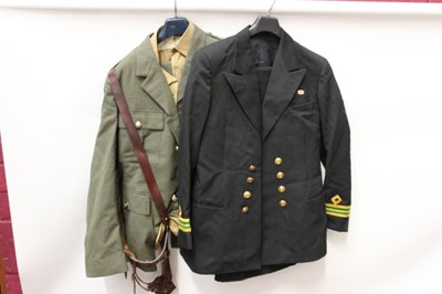 Lot 885 - Group of military uniform to include Royal Navy jackets, Sam Browne belt and other uniforms (1 box)