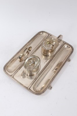 Lot 382 - 1920s silver ink stand of rectangular form, with two silver inkwells.