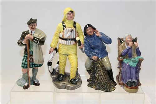 Lot 1073 - Four Royal Doulton figures - The Lifeboat Man...