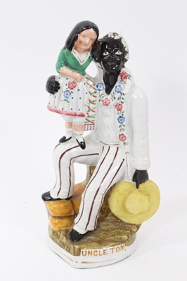 Lot 250 - Staffordshire pottery group of Uncle Tom and Little Eva