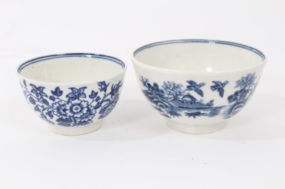 Lot 182 - A Worcester Fence pattern stand for a butter tub, two blue printed tea bowls and a saucer (the saucer with rare 'Man in the Moon' mark)