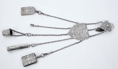 Lot 393 - Late Victorian silver sewing chatelaine with ornate cast belt hook and five suspension chains