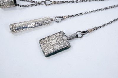 Lot 393 - Late Victorian silver sewing chatelaine with ornate cast belt hook and five suspension chains