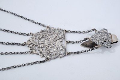Lot 393 - Late Victorian silver sewing chatelaine with ornate cast belt hook and five suspension chains