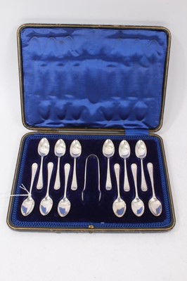 Lot 397 - Late Victorian/Edwardian silver matched set of twelve teaspoons and pair of sugar tongs