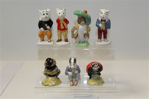 Lot 1076 - Four Beswick Rupert and His Friends figures -...