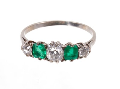 Lot 484 - Emerald and diamond five stone ring