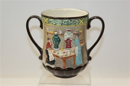 Lot 1077 - Royal Doulton loving cup - Pottery In The Past...