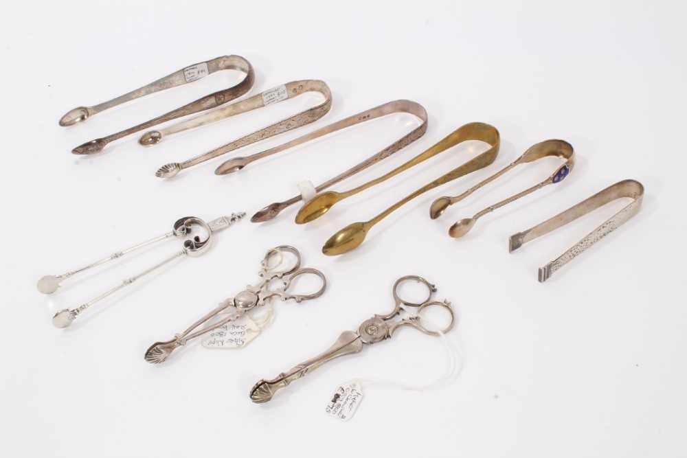 Lot 736 - Good collection of silver and other sugar nips, 18th century and later