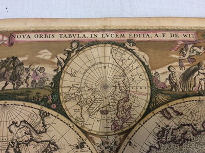 Lot 749 - Frederick De Wit - Nova Orbis Tabula, in Lucem Edita, late 17th century hand coloured engraved map of the world, with figural vignettes, total size 52 x 62cm
