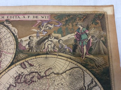 Lot 749 - Frederick De Wit - Nova Orbis Tabula, in Lucem Edita, late 17th century hand coloured engraved map of the world, with figural vignettes, total size 52 x 62cm