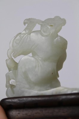 Lot 784 - Good Chinese carved jade figure, together with a carved jade bi-disc