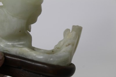 Lot 784 - Good Chinese carved jade figure, together with a carved jade bi-disc