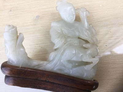 Lot 784 - Good Chinese carved jade figure, together with a carved jade bi-disc