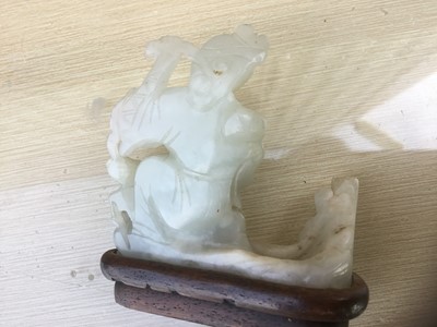 Lot 784 - Good Chinese carved jade figure, together with a carved jade bi-disc