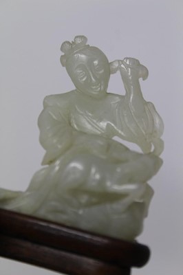 Lot 784 - Good Chinese carved jade figure, together with a carved jade bi-disc