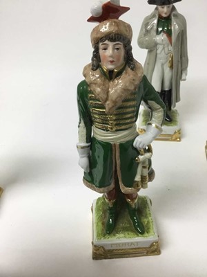 Lot 1160 - Four Continental porcelain military figures, 26cm high, impressed details to bases and marked Made in GDR'