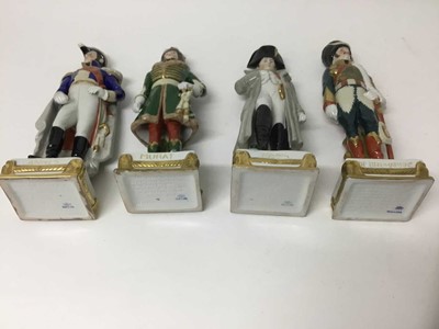 Lot 1160 - Four Continental porcelain military figures, 26cm high, impressed details to bases and marked Made in GDR'