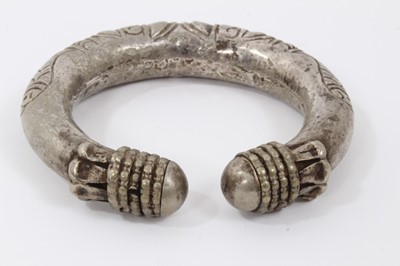 Lot 803 - North African silver torque, decorated with fish and geometric motifs, 10cm wide