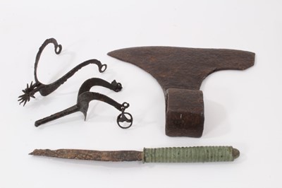 Lot 828 - Two early iron spurs, together with a bronze handled knife and an iron axe head