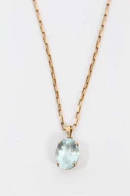 Lot 510 - Aquamarine single stone pendant with an oval mixed cut aquamarine measuring approximately 15.9mm x 12mm x 7.9mm in 9ct gold setting on 9ct gold chain.