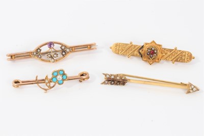 Lot 512 - Four Edwardian gold brooches to include a turquoise and seed pearl forget-me-not brooch.