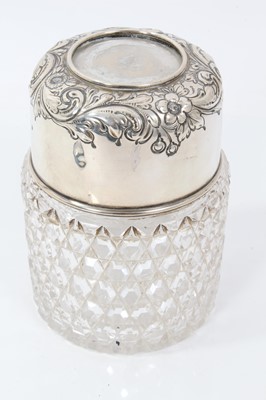 Lot 1958 - Large early 20th century American silver and cut glass scent bottle, removable top with embossed scroll decoration, stamped Birks, Sterling, 13cm in overall height
