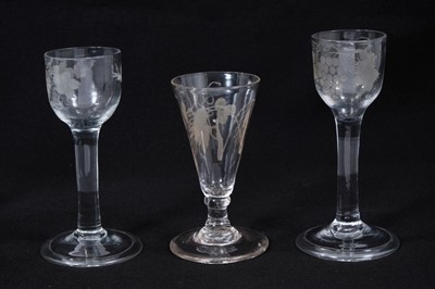 Lot 1927 - Three Georgian wine glasses, with etched ogee, ovoid and trumpet bowls, between 12cm and 14.5cm high