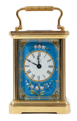 Lot 661 - Halcyon Days miniature enamel carriage clock with floral decoration on blue ground, 7.5cm high