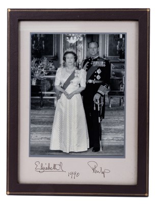 Lot 39 - H.M.Queen Elizabeth II and H.R.H. The Duke of Edinburgh - signed 1990 presentation portrait photograph - presented to a long serving gardener at Sandringham on his retirement.