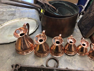 Lot 252 - Graduated set of 19th century copper pans, also iron hanging rack copper measures
