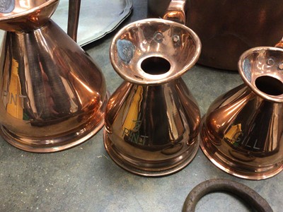 Lot 252 - Graduated set of 19th century copper pans, also iron hanging rack copper measures