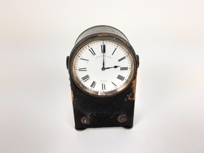 Lot 1948 - Early 20th century Asprey leather-mounted travelling clock, with white metal mounts, chain and bun feet, 9.5cm high