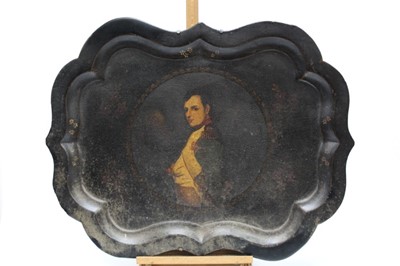 Lot 1955 - Large Victorian lacquered tray with a portrait of Napoleon, together with a lead plaque of Napoleon, a Napoleon paperweight, and a Wellington cast iron door stop (4)