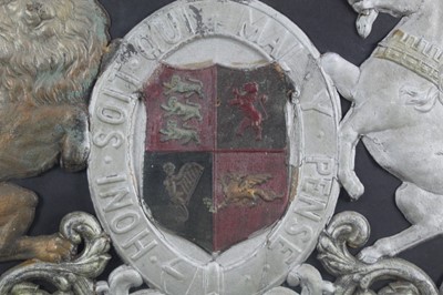 Lot 1956 - Unusual embossed and painted leather panel depicting the coat of arms, with 'God save the King', framed and glazed, the frame measuring 57cm x 76cm