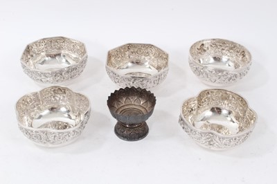 Lot 423 - Five Far Eastern white metal bowls of various shapes, and one other