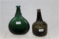 Lot 1115 - 18th century green glass mallet-shape wine...